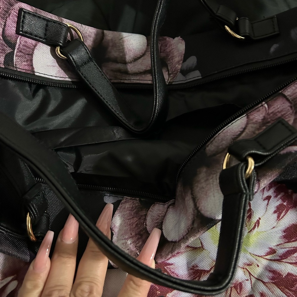 Black and Pink Floral Travel Bag with Structured Design